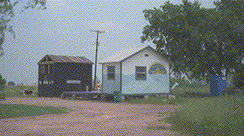 [Picture of shacks]